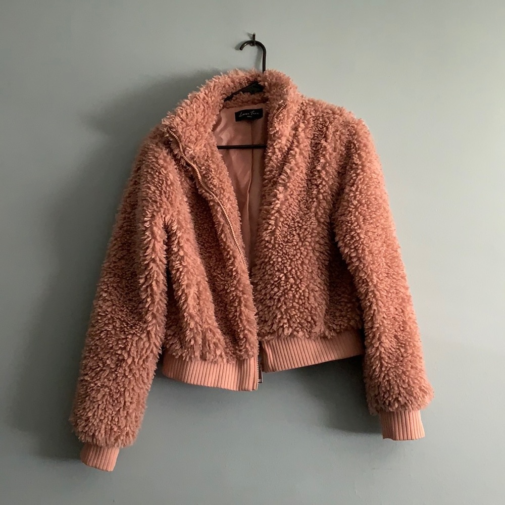 Love Free pink fuzzy jacket.